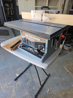 Delta router/shaper with raised panel  bits