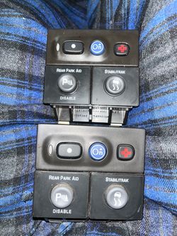Escalade 2000-2002 OnStar, Stabilitrak, and Rear Park Aid switch pod/assembly