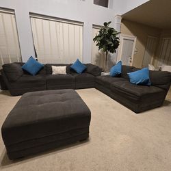 Gray Three Piece Sectional Sofa