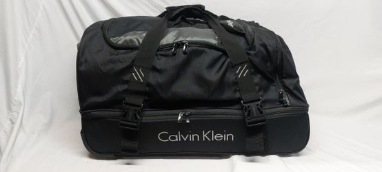 Calvin Klein rolling expandable carry on bag