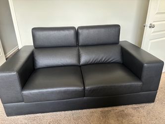 Black Leather Loveseat with Adjustable Headrests