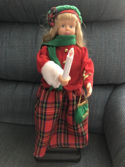 17” Christmas Doll that plays music.