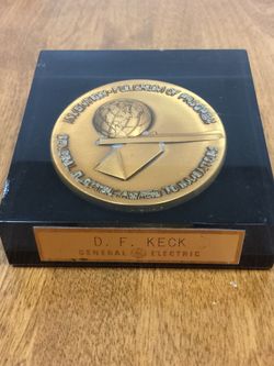 Vintage General Electric medallion award in acrylic