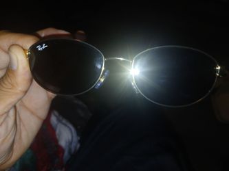 Ray bans gold frame black lenses