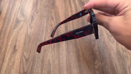 Black and red Prada sunglasses