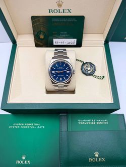 Brand New 2026 Rolex Oyster Perpetual 41mm 134300 Blue Dial Smooth Bezel Steel Oyster Full Set Box Card Booklets