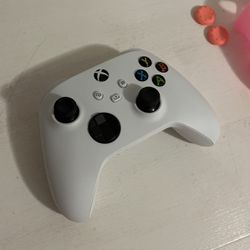 white xbox controller, with pink case