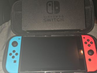 Nintendo Switch with Neon Joy-Cons and Case