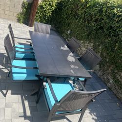Outdoor big  iron table with 6 beautiful chairs.