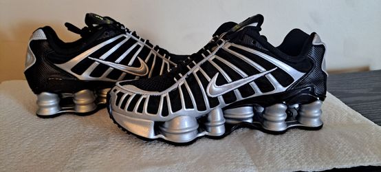 New Nike Shox TL sneakers in a black and metallic silver