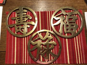 Brass Chinese symbols