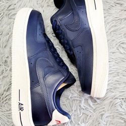 Size 7 Women's Nike Air Force 1 '07 Low Orewood Obsidian Red DZ2708-100.
