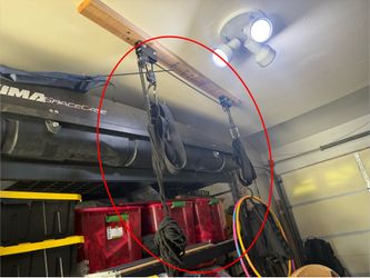 Garage storage pulley system