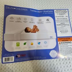 Delta Children Twinkle Stars™ Breathable 4" Mini Mattress. White mattress and cover.