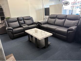 Black sofa and love seat manual recliner set