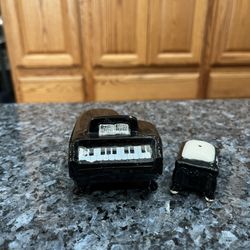 Vintage Ceramic Piano and Bench Pair of Salt and Pepper Shakers.  Size approximately 2 inches tall.  Preowned some wear.  Has been in display in a cab