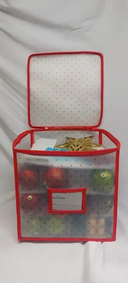 Christmas tree ornaments (111 items) with storage container;