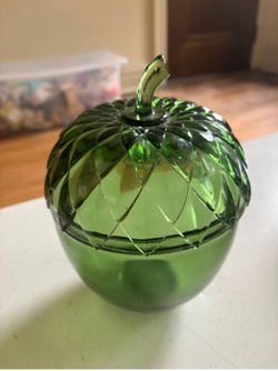 Green glass acorn shaped candy dish