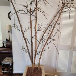 8 foot artificial tree with pot. 