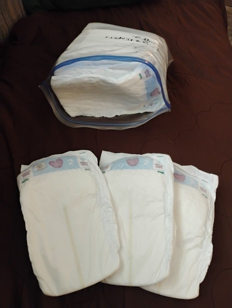 Opened Pack Of 28 Baby Diapers Size:2 Free