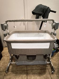 Baby Bassinet with Mobile and Storage