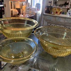 12 inches is the largest. 3 matching graduated amber mixing bowls. 45.00 for all.    Johanna at Antiques and More. Located at 316b Main Street Buda. A