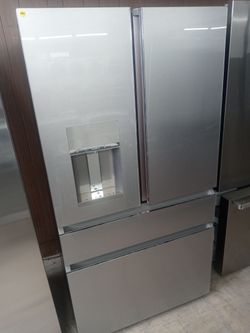 GE Cafe stainless steel four-door french door refrigerator with glass front - Free delivery