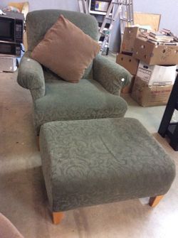 Clean green chair with matching ottoman