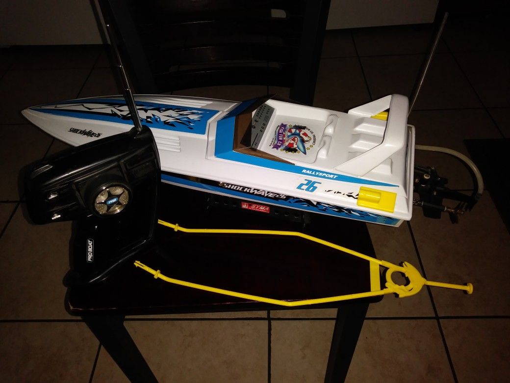 RC Remote control Pro boat shockwave 26 with fishing pole attachment.... Fast