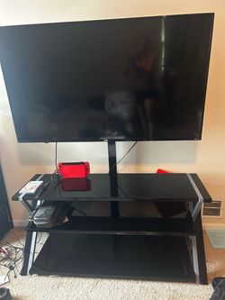 48in Roku tv with 3 tier black stand