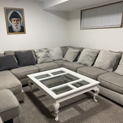 Section Sofa With A Table 