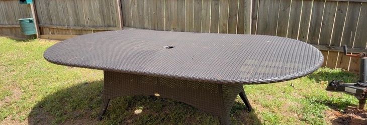 Elegant Gloster brand dining outdoor wicker table seats 8