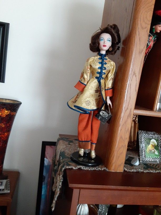 Gene Oriental Doll, and a Barbie Emprince Doll for sale. Glass Ware, Oil Painting 