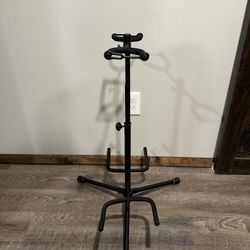Used Double Guitar Stand In Good Condition 