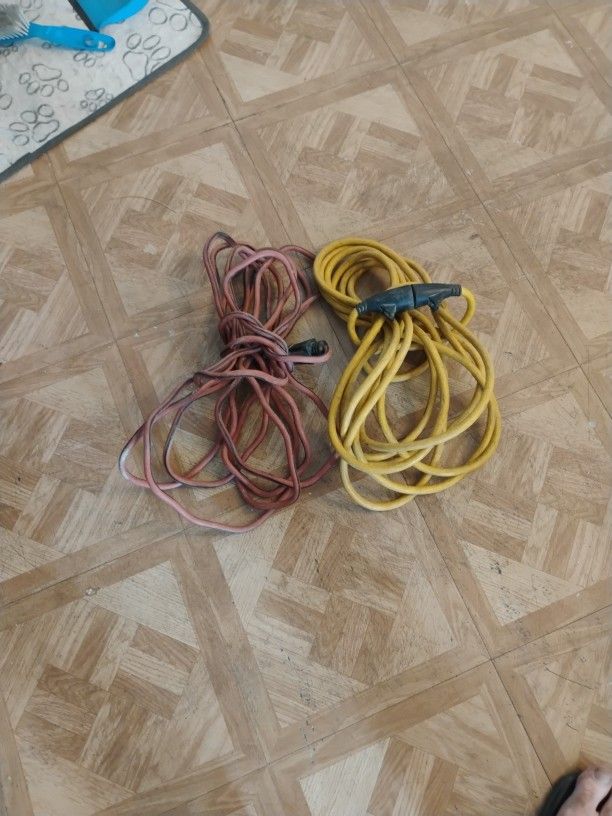 One 12 Gauge 25ft Extension Cord & One 10 Gauge 25ft Extension Cord