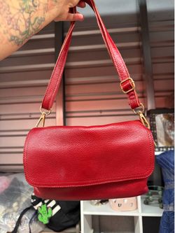 Red purse with lots of storage space