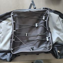 Saddle bag, with rain poncho, for bicycle