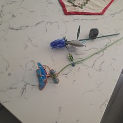 Two Outdoor Plant Accessories The Tulip Is Solar, Butterfly Is Sparkly With Marbles In Its Body