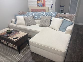 Cream sectional sofa with right facing chase