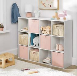 11" 12 Cube Organizer White - Brightroom Retail $70, our price $45 35.94in H x 47.56in W x 11.73in D • 12-cube bookshelf • Solid white hue • Woo