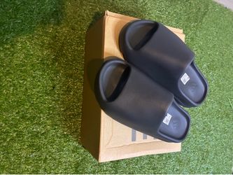 Black Yeezy slides brand new