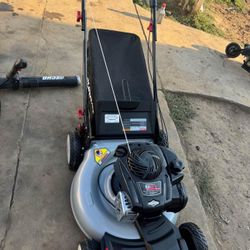 Murray 22 in. 140 cc Briggs & Stratton Walk Behind Gas Self-Propelled Lawn Mower with Front Wheel Dr