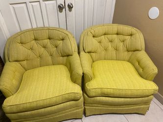 2 yellow cushion chairs