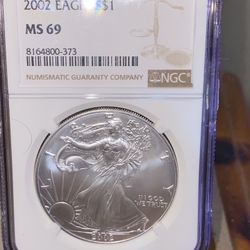2002 Silver Eagle Dollar NGC MS69 $1