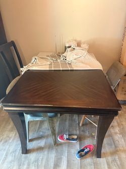Large brown table with extender