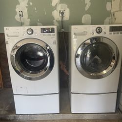 LG Front Load Washer And Dryer With Pedestals 