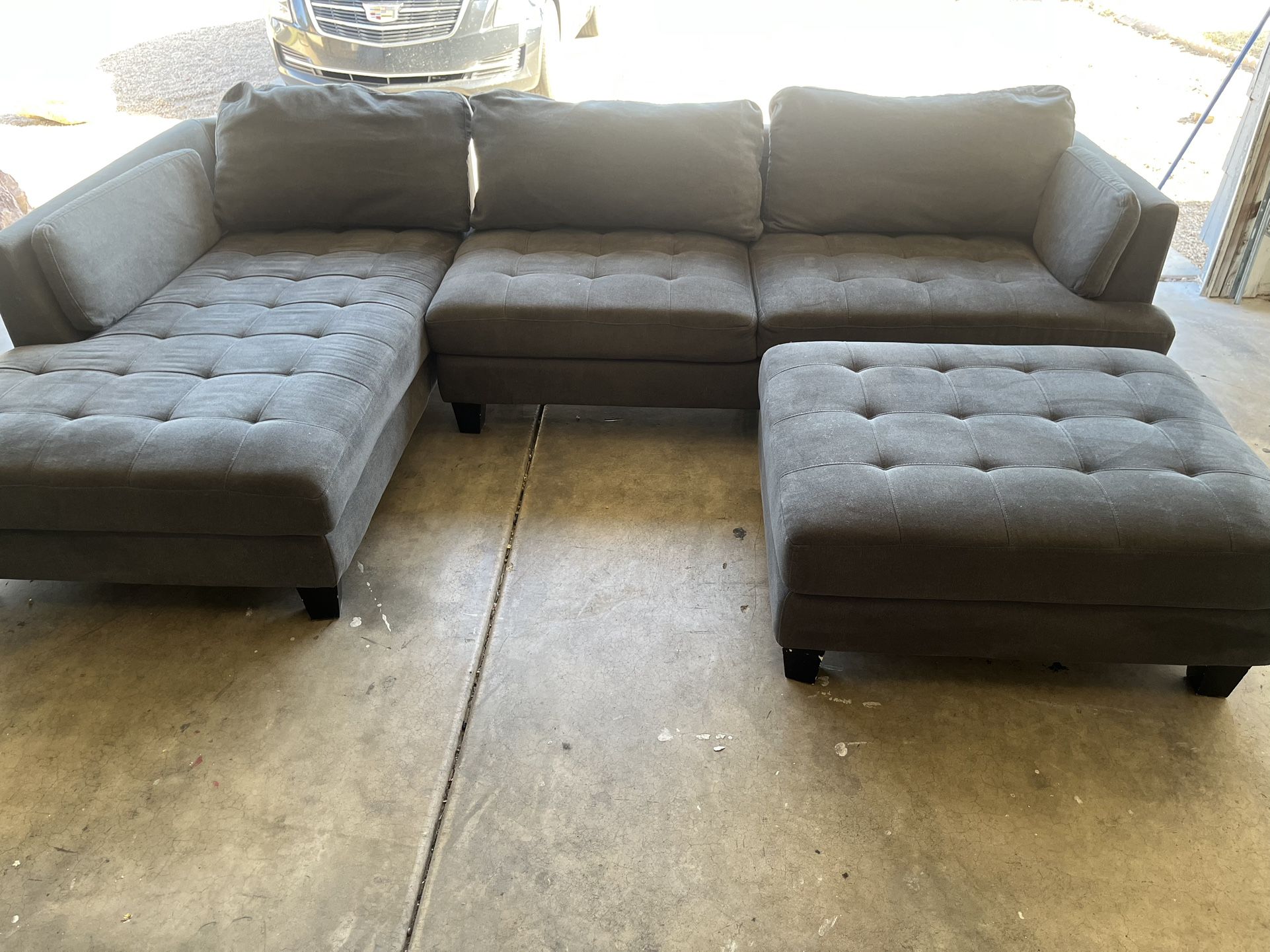 Grey Fabric Couch And Ottoman