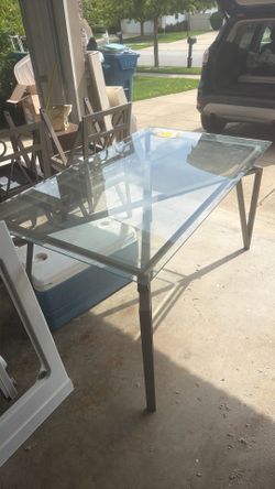 Glass too dining table with 6 chairs