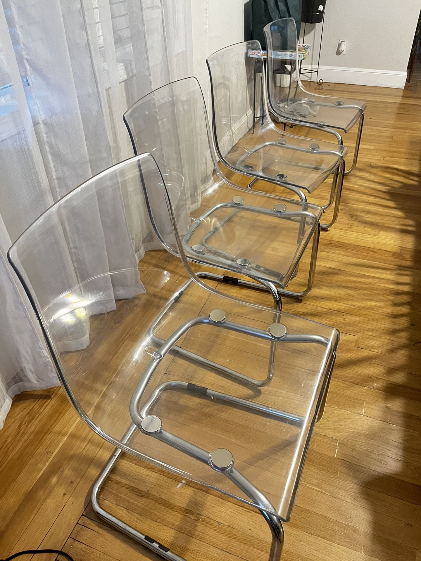 Set Of 4 Clear IKEA Chairs