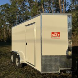 Brand New enclosed 6’x12’ Dual axle. 